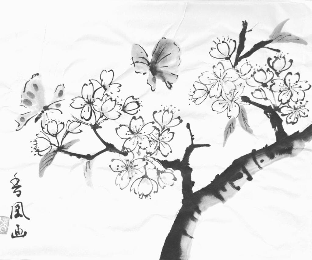 An instructor's sumi-e demonstration painting of cherry blossom branches and butterflies with artist's seal, used as a reference in RESOBOX's Japanese ink painting class in New York