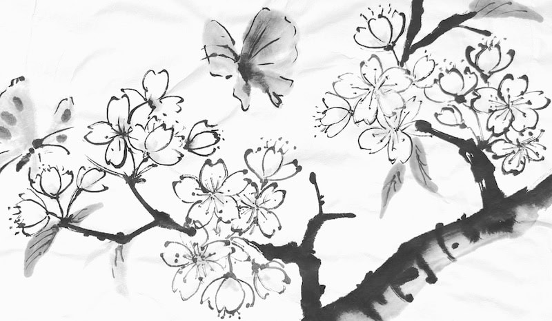 A sumi-e ink painting of cherry blossom branches with butterflies, created in a Japanese brush painting class at RESOBOX in New York