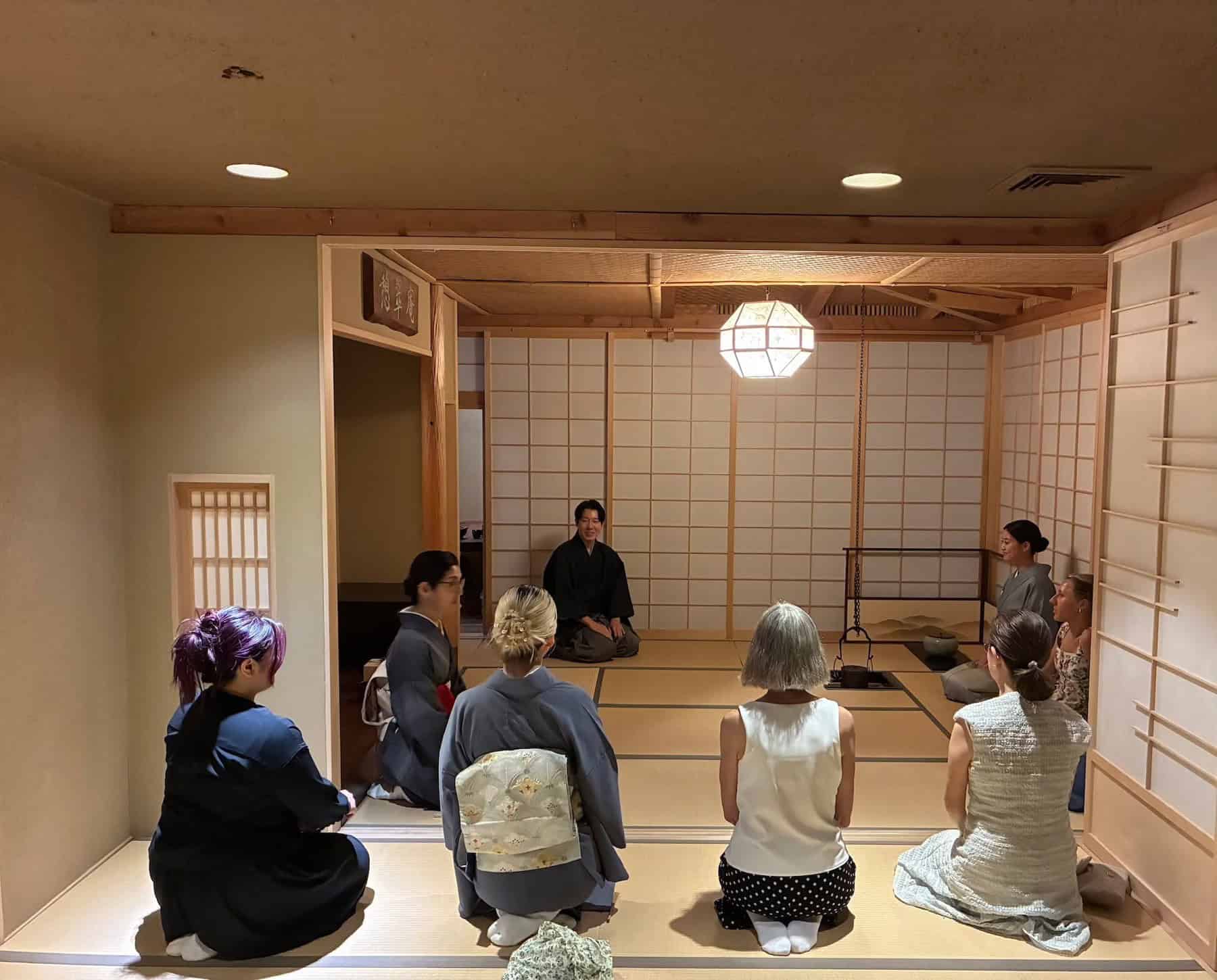 Guests seated in an authentic Japanese tea room at Globus Washitsu during a RESOBOX-hosted tea ceremony featuring Hioki matcha and Chin Jukan teaware