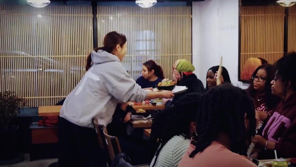Guests enjoying the Kikusui Funaguchi tasting event at WARUDE's Crown Heights location