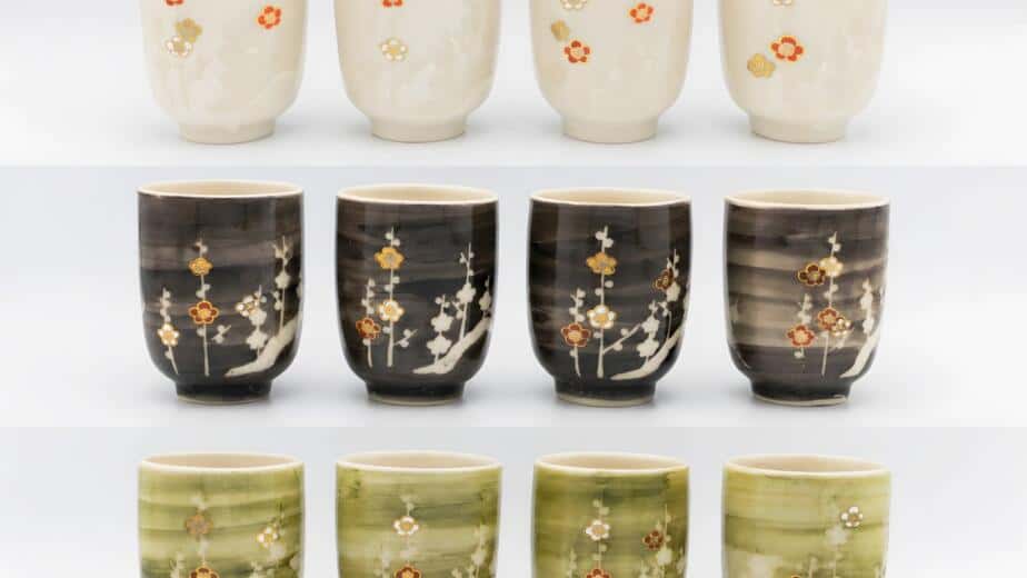 Kyo-yaki and Kiyomizu-yaki yunomi cups with plum blossom motifs created by Atsushi Yamakawa
