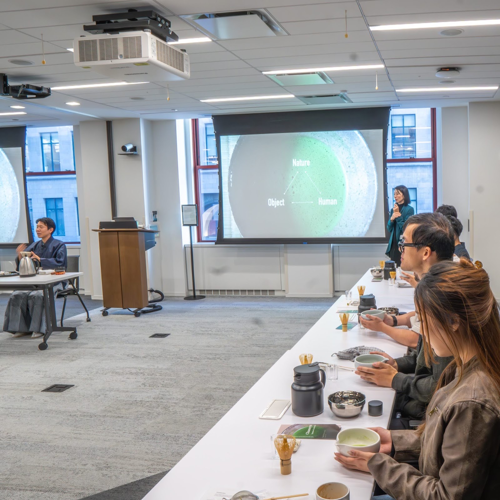LinkedIn team members whisking matcha during a Japanese tea ceremony workshop at their New York office