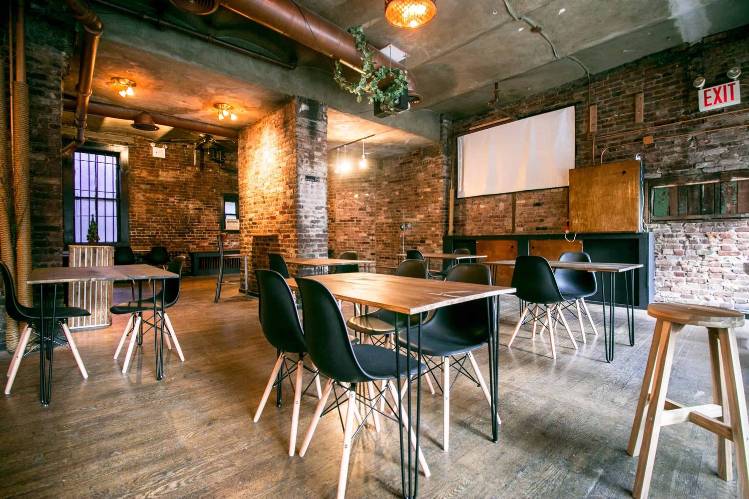 Inside RESOBOX — brick walls, wood tables and workshop chairs in the East Village