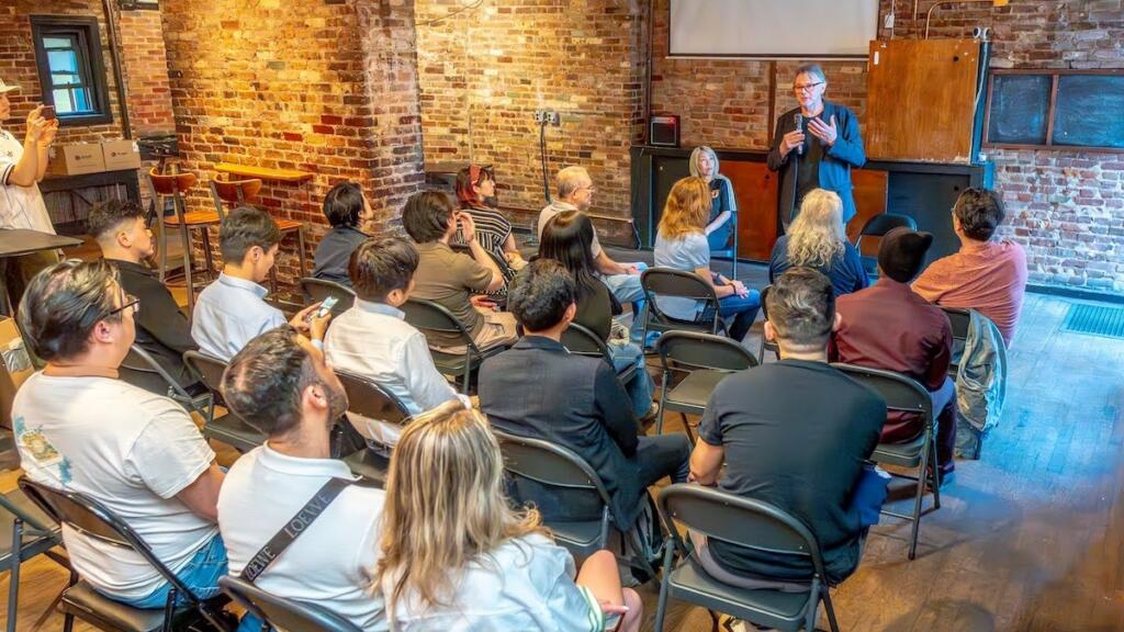 Philippe Troussier speaking to guests during a talk and wine tasting at RESOBOX in the East Village
