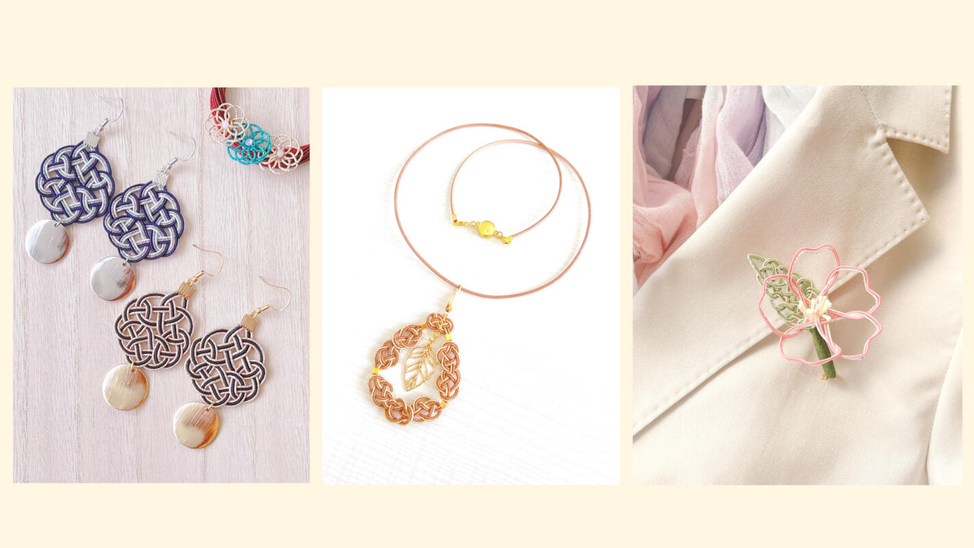 Handcrafted mizuhiki accessories including knotted disc earrings in navy and bronze, a rose-gold leaf pendant necklace, and a delicate sakura brooch on a jacket lapel — made in RESOBOX's mizuhiki class in New York